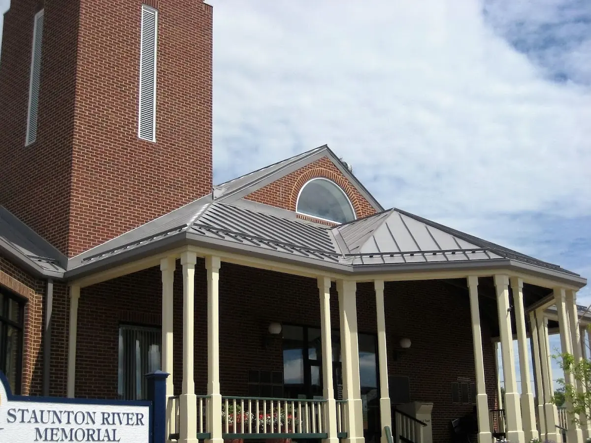 Skilled roofing craftsmen working on a residential roof in Libertytown